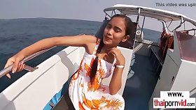 Lean amateur Thai teen Cherry fucked on a boat open-air in doggystyle